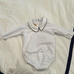 The Beaufort bonnet Peter Pan navy blue trim long sleeve 0-6months top